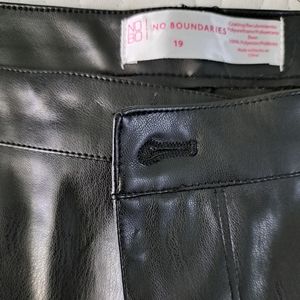 A pair of faux leather jeans